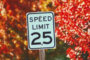 How are speed limits across different roads and streets decided?