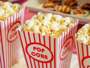 Why do we eat popcorn at the movies?