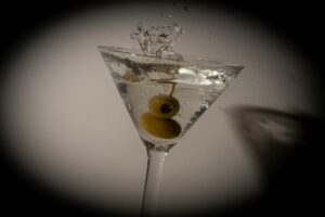 What is the significance of James Bond’s famous phrase ‘martini, shaken not stirred’?