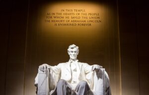 Why is Abraham Lincoln considered great and why was he assassinated?