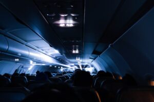 Why do planes dim the lights during take-off and landing?