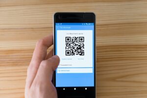 What is a QR code, and why does it have 3 squares in the corners?